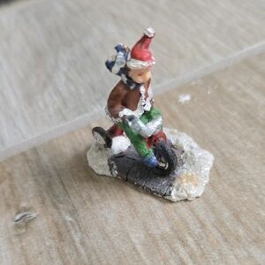 Festive Holiday Figurine with Red and Green Accents